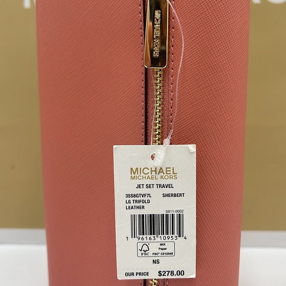 MICHAEL KORS JET SET TRAVEL LARGE TRIFOLD WALLET SHERBERT COLOR
NWT - Picture 8 of 16